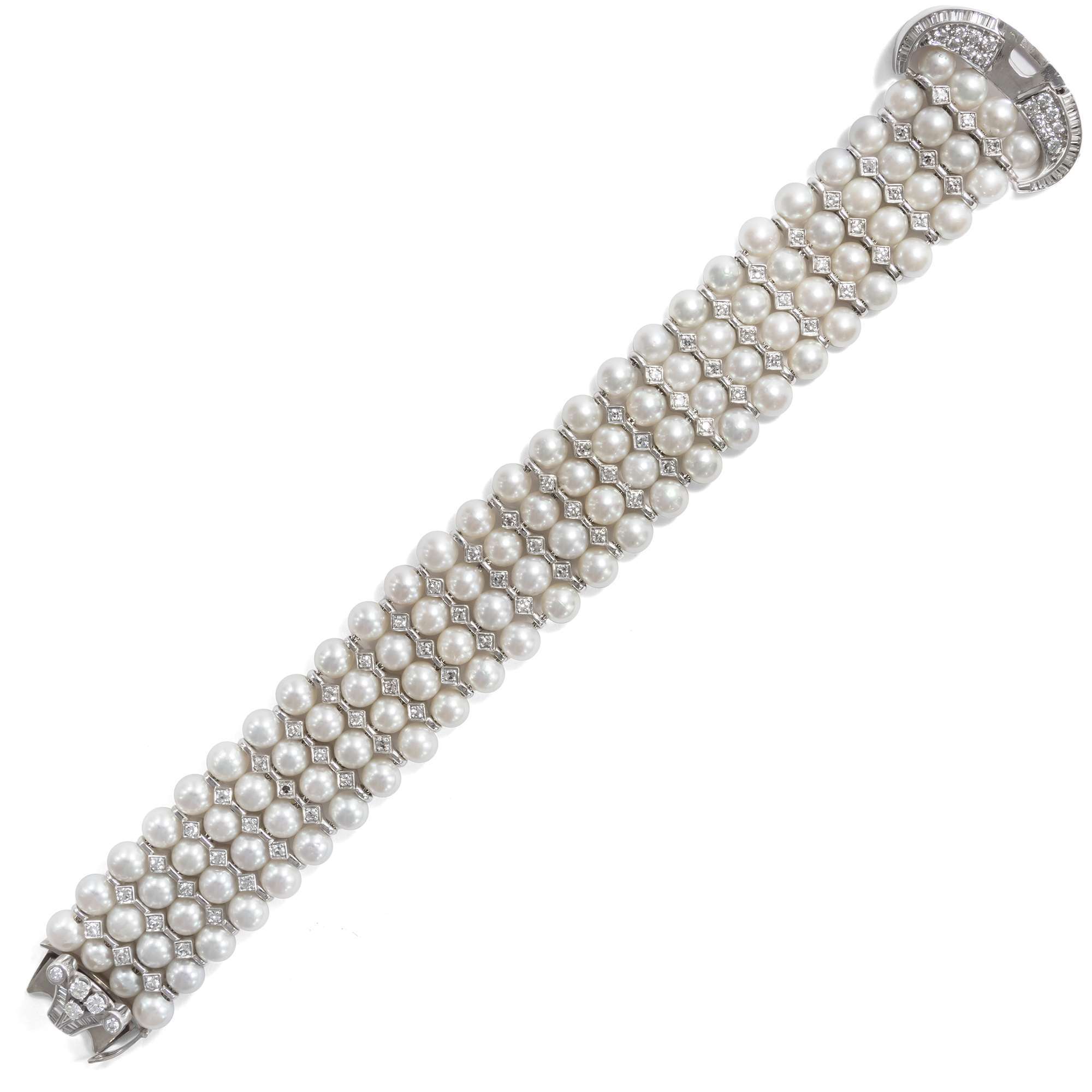 616231-hofer-antikschmuck-Glamouroeses-Jarretiere-Armband-aus-Perlen-und-Diamanten-um-1965-Tradition-und-Moderne_4
