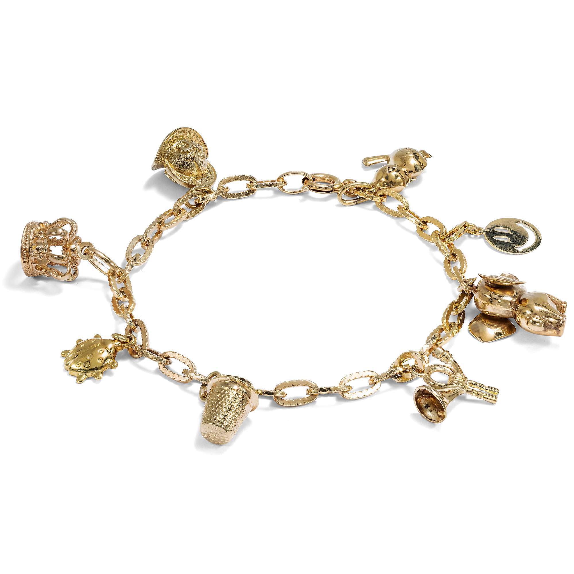 625967-hofer-antikschmuck-Witziges-Bettelarmband-aus-Gold-mit-acht-Anhaengern-Deutschland-um-1965-und-spaeter-Sammelfreuden