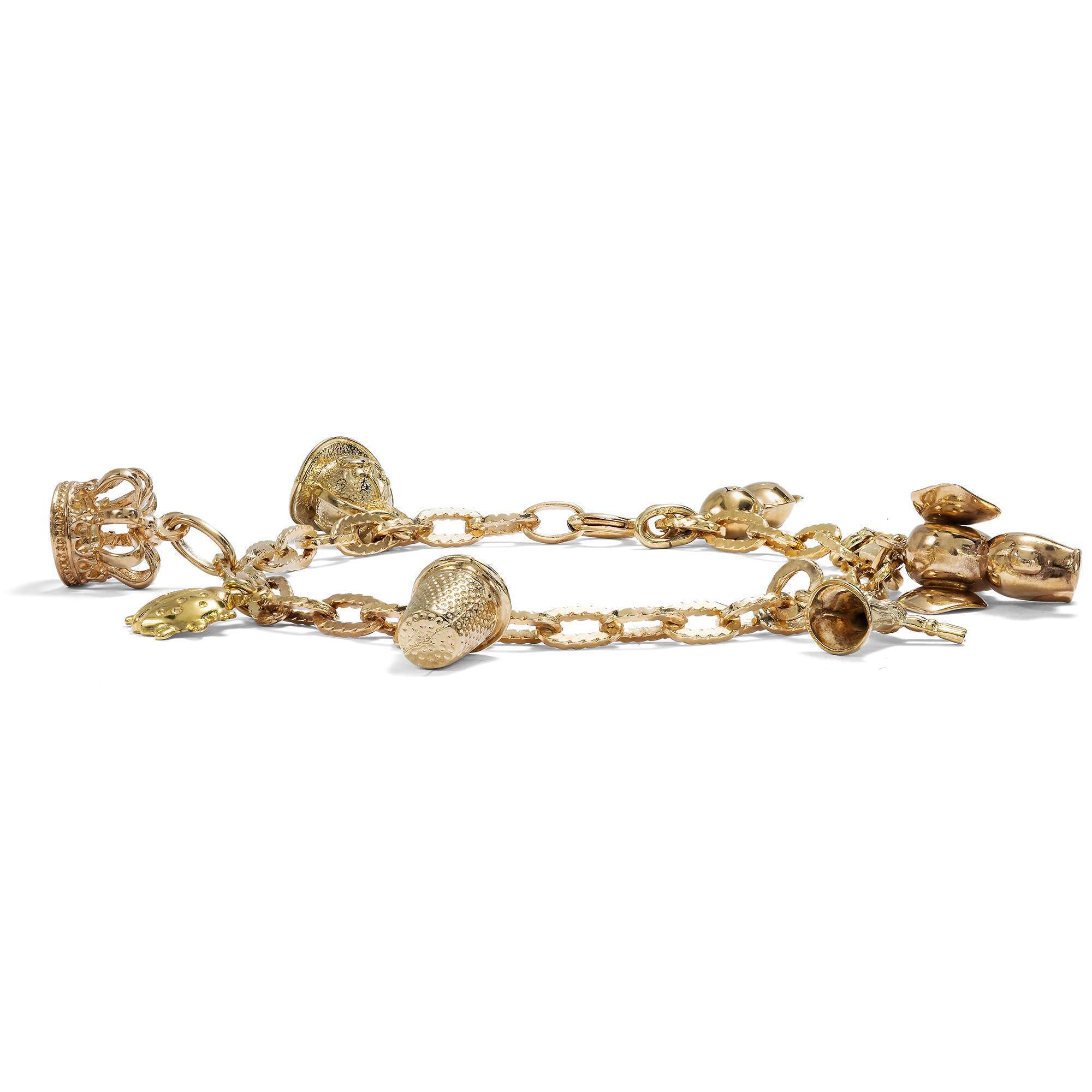 625967-hofer-antikschmuck-Witziges-Bettelarmband-aus-Gold-mit-acht-Anhaengern-Deutschland-um-1965-und-spaeter-Sammelfreuden_1