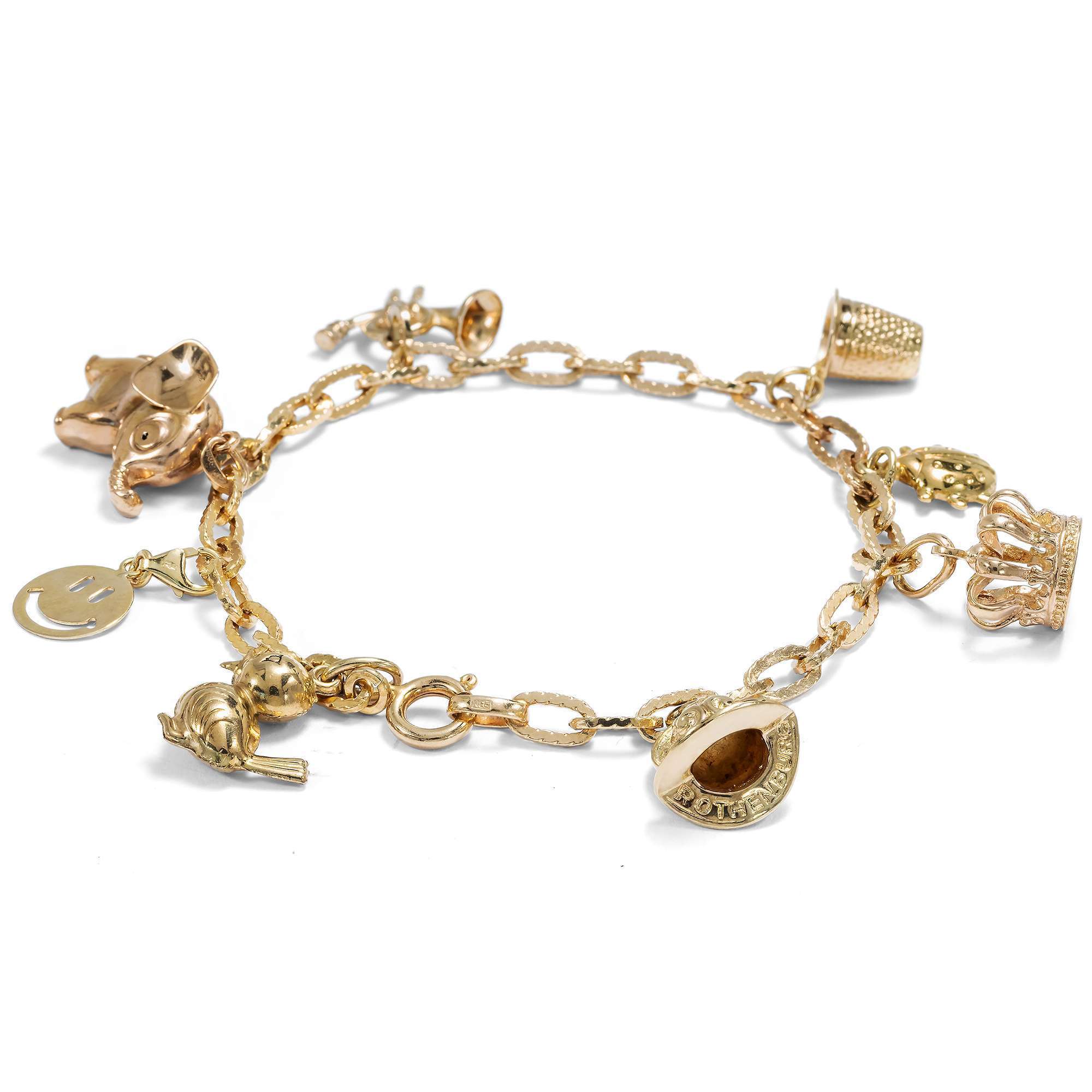 625967-hofer-antikschmuck-Witziges-Bettelarmband-aus-Gold-mit-acht-Anhaengern-Deutschland-um-1965-und-spaeter-Sammelfreuden_2